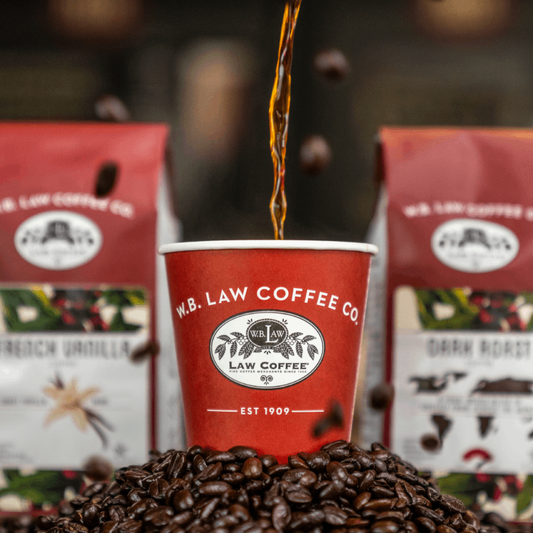 coffee pouring into a red WB Law Coffee Cup