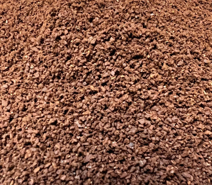 A pile of roasted and ground coffee