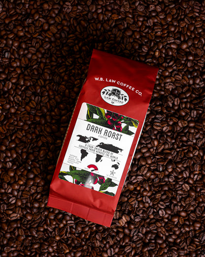 A 12oz retail bag WB Law Coffee's Dark Roast coffee perfect for brewing a bold smokey cup of coffee
